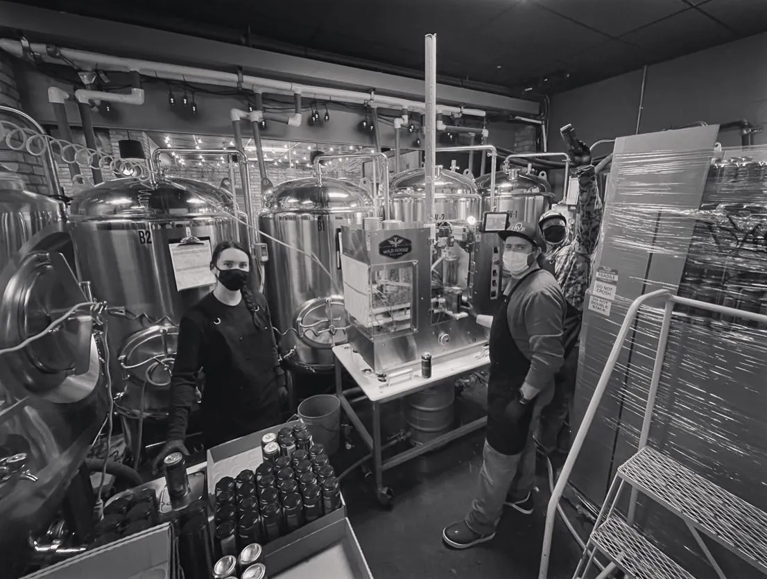 Brewers brewing beer