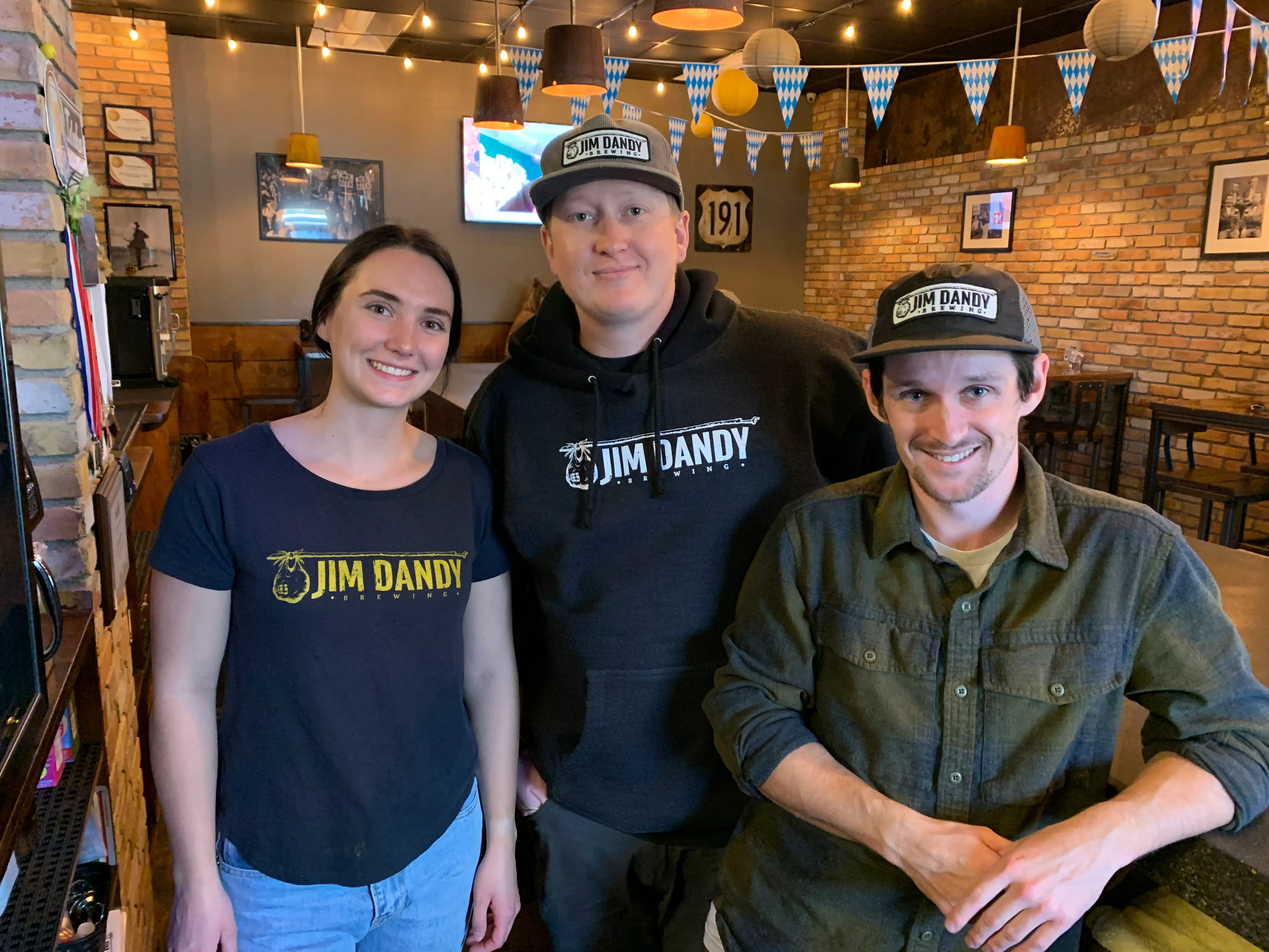 Jim Dandy employees wearing merch